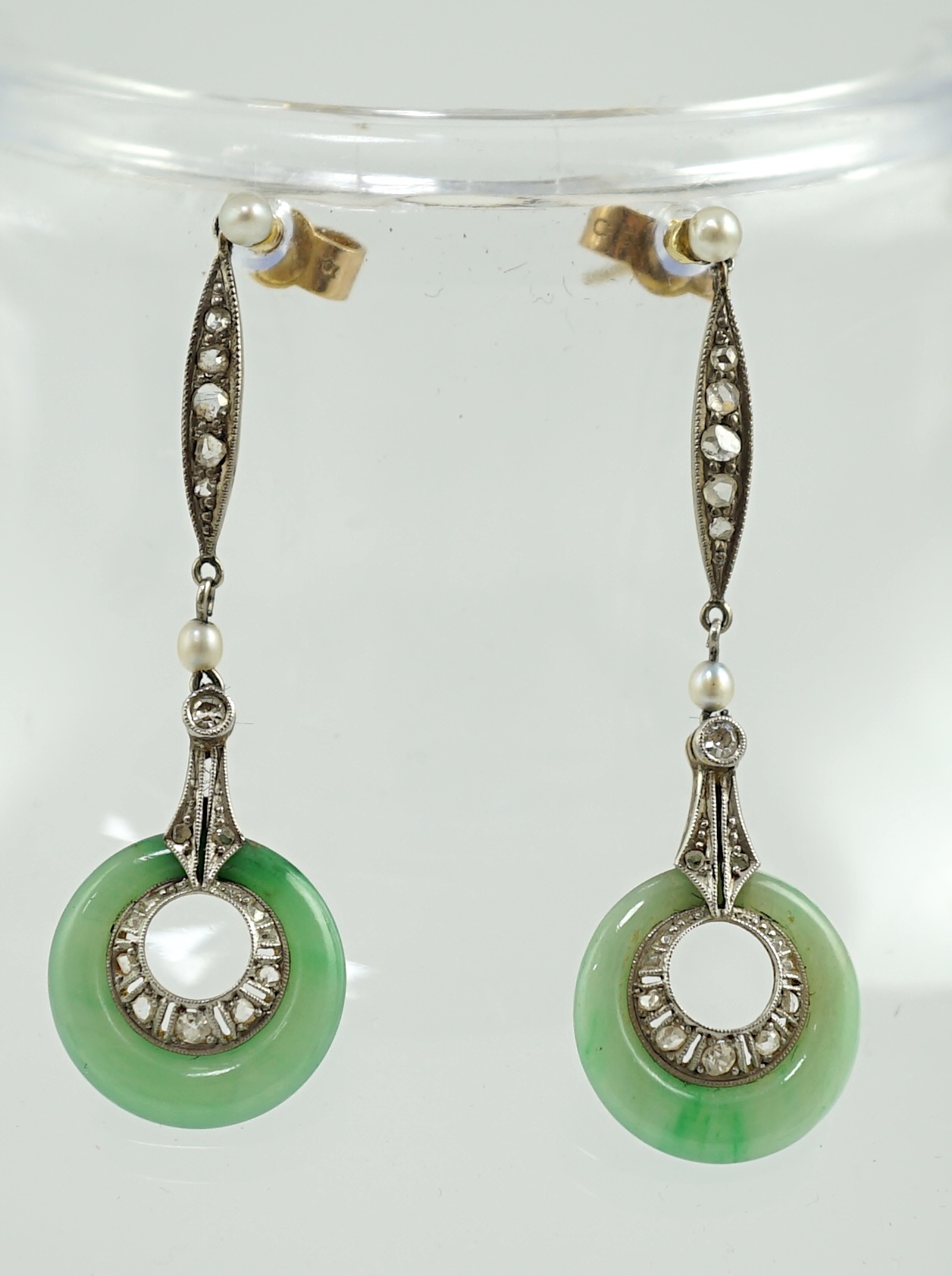 A pair of 1920's 18ct gold, diamond, seed pearl and jade disc set drop earrings
